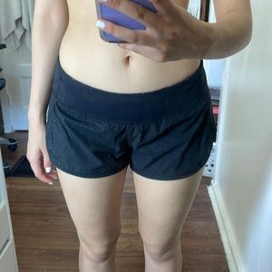Black Lululemon athletic shorts